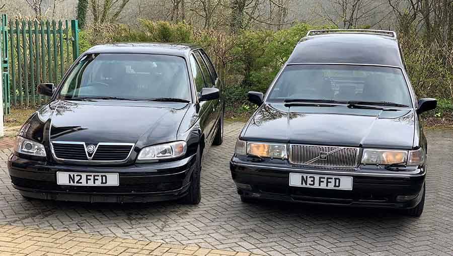 Friendship and sons funeral cars parked